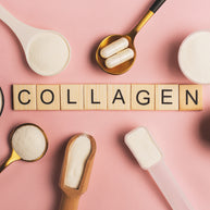 Various scoops and containers of collagen powder surround the word "COLLAGEN" spelled out with wooden letters on a pink background.