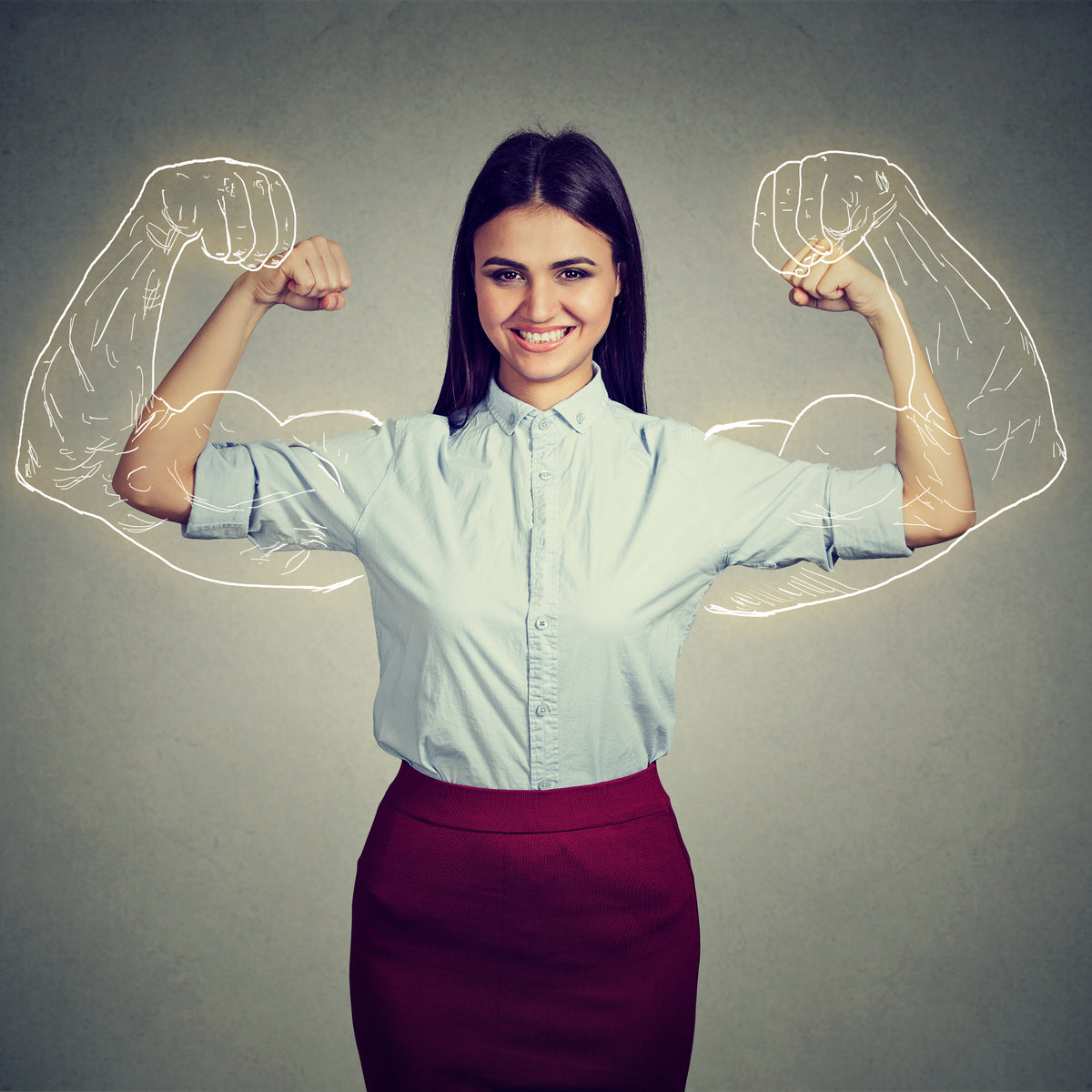 A smiling woman in a light blue shirt and a maroon skirt flexes her arms, with illustrated muscular arms drawn around hers, against a gray background, symbolizing strength and energy.