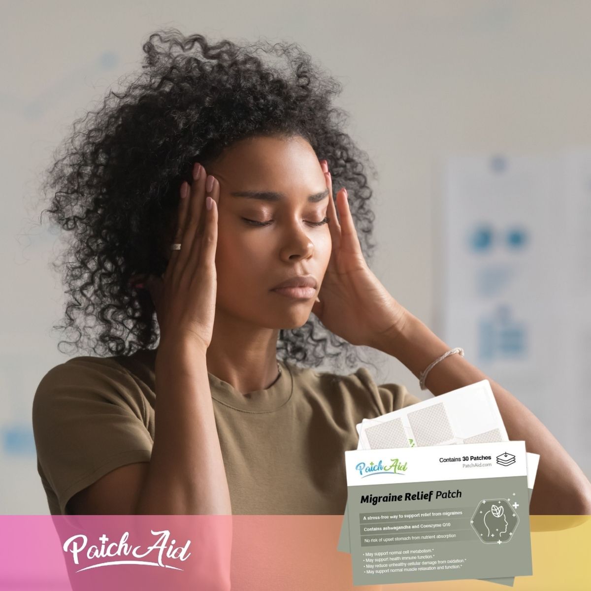 A woman with curly hair holds her head in discomfort, eyes closed, in a bright room, while a package of Migraine Relief Patches by PatchAid is displayed in the foreground.