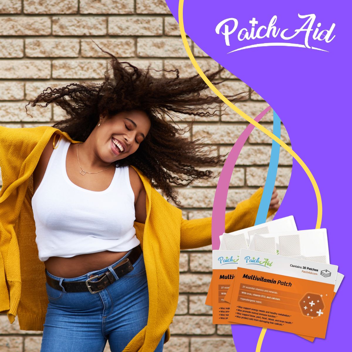 A joyful woman with curly hair dances in front of a textured brick wall, wearing a white tank top and a yellow cardigan, while multivitamin patches are displayed beside her.