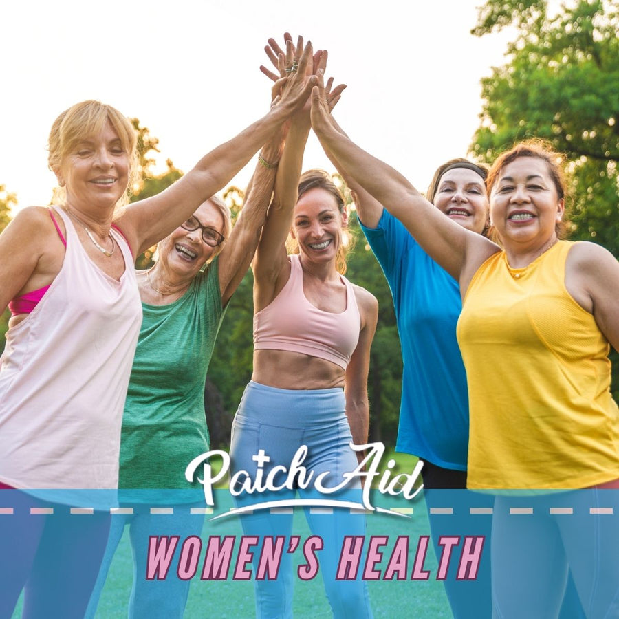 Five women of diverse ages and backgrounds celebrate together outdoors, smiling and raising their hands in a high-five gesture, promoting women's health and community support.